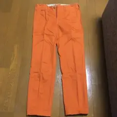 メンズビギ　パンツ　オレンジ