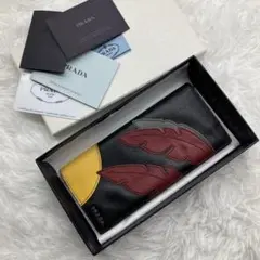 《美品・希少》 PRADA 長財布 サフィアーノ ブラック ロゴ SUN 太陽