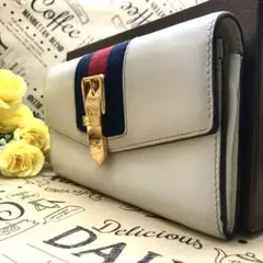 グッチ シルヴィ 長財布 二つ折り ボタン留 シェリーライン レザー EL294