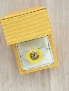 猫の顔 花型リング イエロー