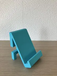 棒人間が支えているスマホスタンド
