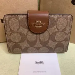 コーチ 折財布 ブラウン デザイン