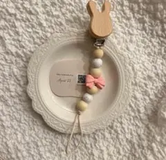 【名入れ無料】おしゃぶりホルダー ⌇⌇うさぎ りぼん ハンドメイド 出産祝い