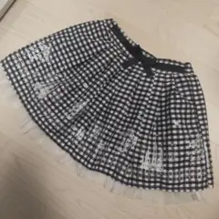 【値下げ不可】チェック柄フリルスカート　メリーゴーランド/観覧車/お城　110