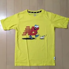 New Balance イエロー Tシャツ
