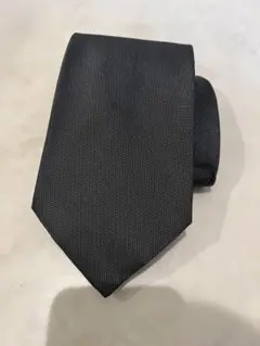 Prada プラダ　少し光沢のあるダークグレー