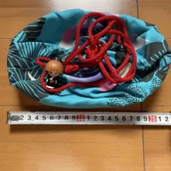 青色と黒色の楕円形巾着袋
