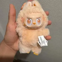 labubuオレンジ色のぬいぐるみキャラクター