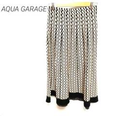 AQUA GARAGE フレアスカート 白黒幾何学模様 ひざ丈 M 伸縮性