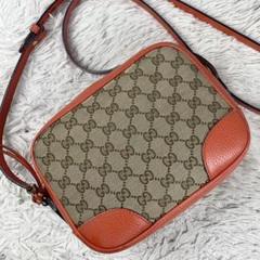 美品 グッチ キャンバス ショルダーバッグ GG柄 ロゴ型押し チャーム 茶のサムネイル