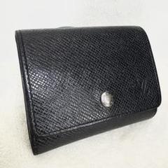 美品】VUITTON コインケース 黒 タイガ ポルトモネ セルゲイ 本