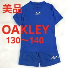 美品爽やか❗️OAKLEY オークリー　Tシャツ　ハーフパンツ　キッズ　上下セットのサムネイル