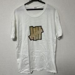 アンディーフィーテッド ホワイト グラフィックプリント Tシャツ