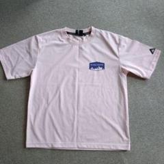 ユニセックスTシャツ ロゴ付き
