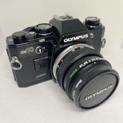 【訳あり大特価】OLYMPUS OM-1 フィルムカメラ標準レンズ付296301 訳あり特価❗️】OLYMPUS OM-1 – Ein Camera