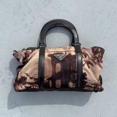 希少 prada ハンドバッグ ナイロン 総柄 風景画 テスート 希少 prada ハンドバッグ ナイロン 総柄 風景画 テスート - メルカリ