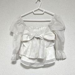 ラメシアーリボンペプラムトップス