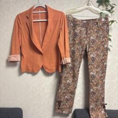 ギャラリービスコンティ オレンジジャケットとマルチカラー花柄パンツセット