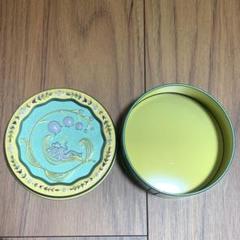 空き容器　スズランと妖精のデザイン缶