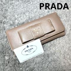 PRADA プラダ 長財布 二つ折り リボン　サフィアーノ メタルロゴ ピンク 2025年最新】プラダ リボン 財布の人気アイテム - メルカリ