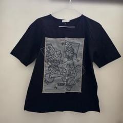 レディースコットン100% Tシャツ　M 黒のグラフィックプリントTシャツ　美品