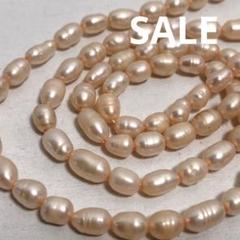 dn596/SALE！淡水パール◇艶あり　オレンジ系　ライスバロック形2連