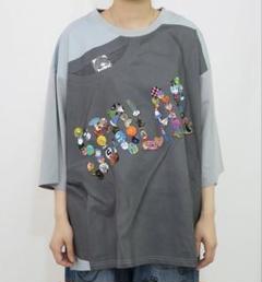 スカラー ScoLar ロゴバッヂトリックアート柄Tシャツ （ブラック） スカラー ScoLar ロゴバッヂトリックアート柄Tシャツ （ブラック