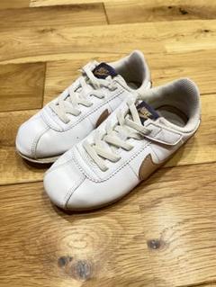 Nike ホワイト/ゴールド スニーカー