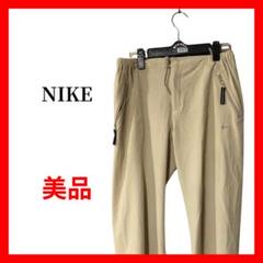NIKE レディース イージーパンツ ベージュ M ジップポケット B1818