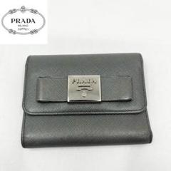 良品✨　PRADA サフィアーノレザー　グレー 三つ折り財布　リボン　フィオッコ 良品✨PRADA サフィアーノレザーグレー 三つ折り財布リボン