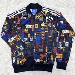 ゴージャス アディダス adidas(L)トラックジャケット 総柄 トレフォイル