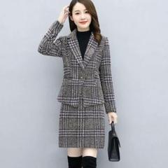秋と冬の2つのセットの格子毛です。女性の新型のセレブ気質はやせて見えます