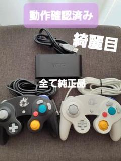 純正Switch接続タップ　WUP-028&綺麗目コントローラースマブラ黒白2個のサムネイル