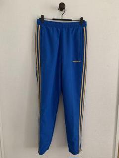 『新品タグ付』adidasアディダスオリジナルストラックパンツ メンズSサイズのサムネイル