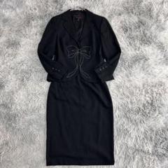 m6673【美品 ESCADA】スカートスーツ 上下 黒 リボン 38 m6673【美品 ESCADA】スカートスーツ 上下 黒 リボン 38 - メルカリ