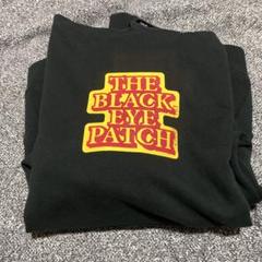 新品未使用　blackeyepatch スッパイマン　コラボ　限定　フーディー ブラックアイパッチ」が沖縄銘菓“スッパイマン”とコラボ パーカ