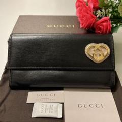【未使用品】GUCCI(グッチ)二つ折り長財布 AU033