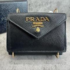 2025年最新】prada プラダ ロゴ型押しの人気アイテム - メルカリ