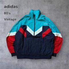 80年代OLD adidas古着ナイロンジャケット刺繍ロゴフルジップネ/R292 80s old adidas古着ナイロンジャケット刺繍ロゴネイビー 〈S54