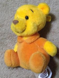 クマのぬいぐるみ 黄色 オレンジ
