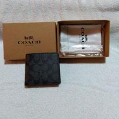 COACH ブラック 二つ折り財布 保存袋付き - メルカリ