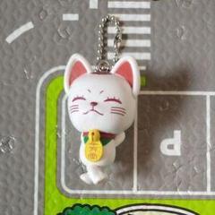 白い猫のストラップ 幸運を呼ぶ