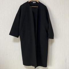 黒のロングコートのサムネイル