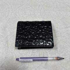 シ*ウ様 marimekkoブラックレザー二つ折り財布 花柄エンボス マリメッコ 花柄 二つ折り 黒 レザー 財布 - メルカリ