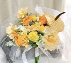 オレンジ・イエローの造花ラウンドブーケ