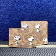 COACHXPEANUTS-3-IN-1シグネチャーキャンバス・スヌーピー財布
