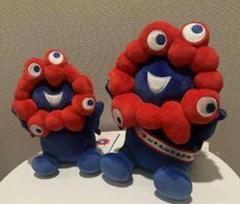 ミャクミャク もちもちぬいぐるみ タスキ Sサイズ相当 おすわり