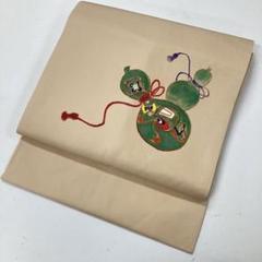 名古屋帯 】正絹ちりめんこけし絵馬駒兜おしゃれ着街着宝尽くし