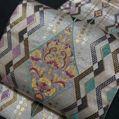 6-105 美品!高級袋帯 人気帯 六通 モダン シック 銀色