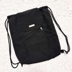 un/neu フラップデイバッグ ブラック ナップサック リュック バッグ